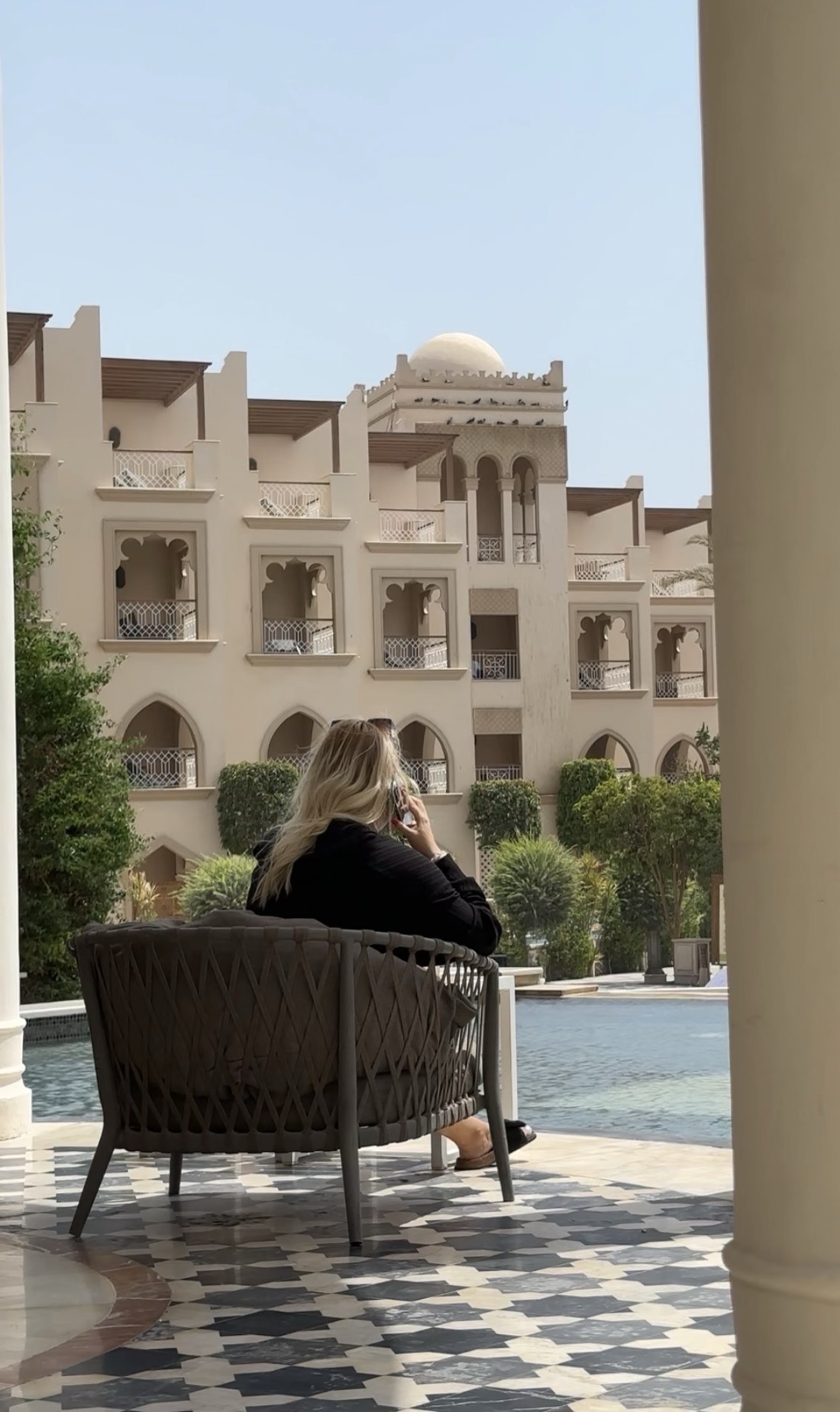 Nikol Kaurova, founder of PRES., at a resort.