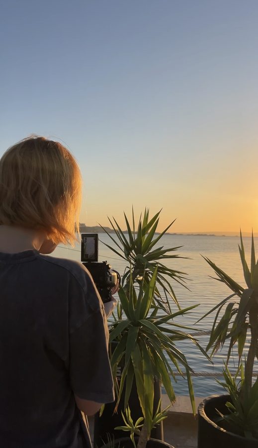 A PRES. creator filming on location at a resort.